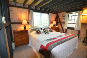 Topside Cottage on Somes Sound Master Bedroom with views of the Ocean and mountains in Acadia National Park